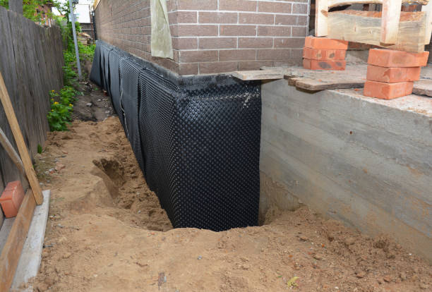 SJ Waterproofing Pros technician performing targeted Foundation Crack Repair assessment in Flintville, TN